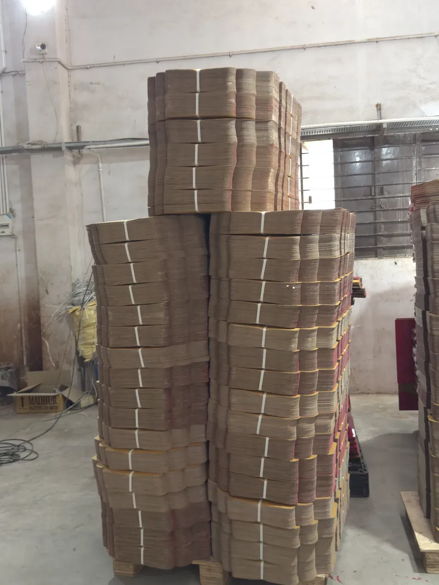 Stacks of corrugated packaging in the factory